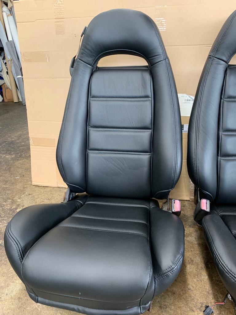 Fully restored black leather car seat by Ranger Seat Cover Miami — 35 years of craftsmanship