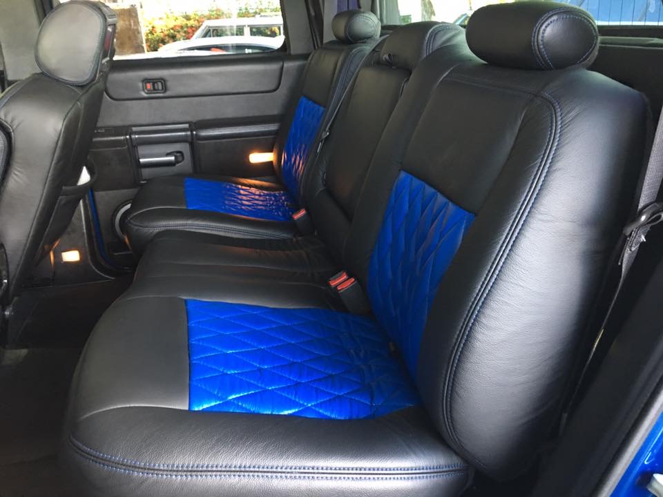 Black and blue two-tone leather seat restoration South Florida